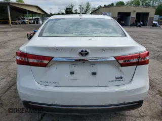 2014 Toyota Avalon Limited z VIN 4T1BD1EB9EU032227, wystawiony jako Copart lot #57016995 z przebiegiem 210 611 mil mil oraz Szkoda całkowita • Salvage title. Historia ofert i sprzedaży dostępna na DreamBid. Obrazek 6.