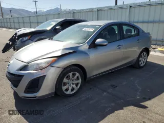 2011 Mazda 3 i Sport with VIN JM1BL1UG7B1455776, listed as a Copart auction lot 54235235 with 133,040 mi miles and Salvage Title. Bid and sale history available at DreamBid. Image 1.