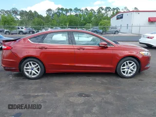 2014 Ford Fusion SE with VIN 3FA6P0H70ER364570, listed as a IAAI auction lot 42147544 with 107,060 mi miles and . Bid and sale history available at DreamBid. Image 13.