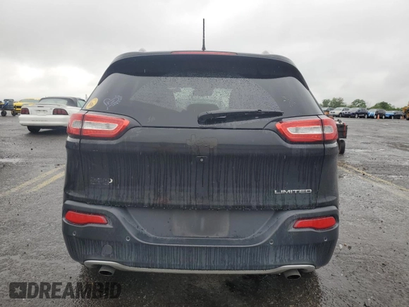 2014 Jeep Cherokee Limited with VIN 1C4PJLDS0EW106560, listed as a Copart auction lot 60785405 with 91,662 mi miles and Salvage title. Bid and sale history available at DreamBid. Image 6.