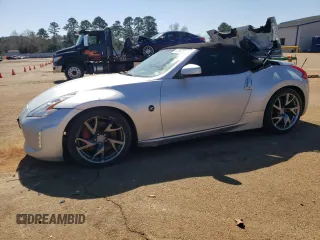 2014 Nissan 370Z Touring with VIN JN1AZ4FH4EM620612, listed as a Copart auction lot 47163375 with 148,458 mi miles and Clean Title. Bid and sale history available at DreamBid. Image 1.