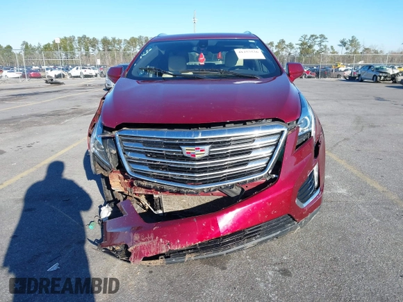 2018 Cadillac XT5 FWD with VIN 1GYKNARS4JZ211455, listed as a IAAI auction lot 41257536 with 102,032 mi miles and . Bid and sale history available at DreamBid. Image 11.