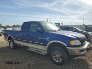 1998 Ford F-150 с VIN 1FTZX18W5WKB98492, выставлен на аукционе Copart как лот 73586864 с пробегом 174 316 миль миль и Списание • Salvage title. История ставок и продаж доступна на DreamBid. Изображение 4.
