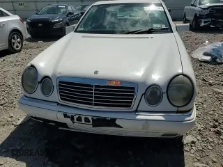1999 Mercedes-Benz E-Class with VIN WDBJF65H0XA877630, listed as a Copart auction lot 69697454 with 0 mi miles and Salvage Title. Bid and sale history available at carsss.com. Image 11.