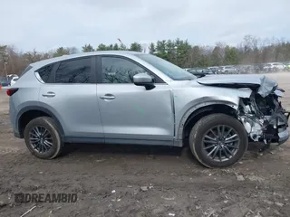 2021 Mazda CX-5 Touring with VIN JM3KFBCM9M1329806, listed as a IAAI auction lot 41825123 with 59,300 mi miles. Bid and sale history available at carsss.com. Image 13.