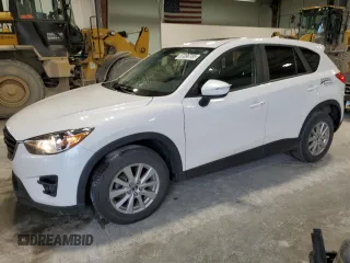 2016 Mazda CX-5 Touring z VIN JM3KE4CY9G0851802, wystawiony jako Copart lot #57396785 z przebiegiem 81 755 mil mil oraz Szkoda całkowita • Salvage title. Historia ofert i sprzedaży dostępna na DreamBid. Obrazek 1.