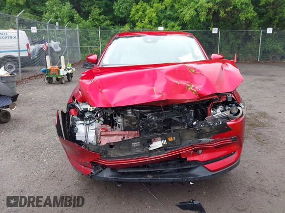 2019 Mazda CX-5 Grand Touring with VIN JM3KFBDM8K0693622, listed as a IAAI auction lot 42503818 with 60,812 mi miles and . Bid and sale history available at DreamBid. Image 11.