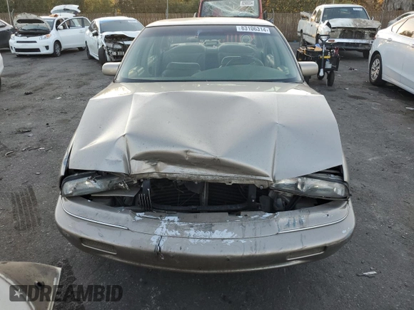 1996 Buick Regal Custom with VIN 2G4WB52K5T1517380, listed as a Copart auction lot 83106314 with 112,411 mi miles and Salvage title. Bid and sale history available at DreamBid. Image 5.