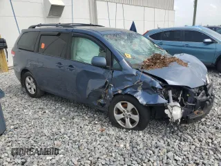 2013 Toyota Sienna LE AAS с VIN 5TDKK3DC3DS359239, выставлен на аукционе Copart как лот 59422285 с пробегом 143 631 миль миль и Списание • Salvage title. История ставок и продаж доступна на DreamBid. Изображение 4.