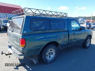 2000 Mazda B-Series 2WD Truck SX with VIN 4F4YR12C9YTM23800, listed as a IAAI auction lot 41409465 with 175,234 mi miles. Bid and sale history available at carsss.com. Image 4.