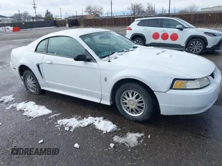 2000 Ford Mustang z VIN 1FAFP4049YF296568, wystawiony jako IAAI lot #41598325 z przebiegiem 144 186 mil mil oraz . Historia ofert i sprzedaży dostępna na DreamBid. Obrazek 1.