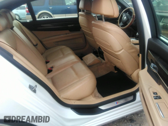 2015 BMW 7 Series 750Li with VIN WBAYE8C50FD781160, listed as a IAAI auction lot 41061232 with 154,496 mi miles. Bid and sale history available at carsss.com. Image 8.