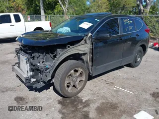 2019 Honda CR-V EX with VIN 7FARW1H58KE025104, listed as a IAAI auction lot 41750649 with 109,574 mi miles. Bid and sale history available at carsss.com. Image 2.