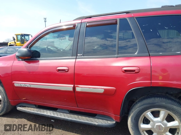 2005 GMC Envoy SLE with VIN 1GKDT13S252127604, listed as a IAAI auction lot 41898390 with 210,655 mi miles. Bid and sale history available at carsss.com. Image 14.