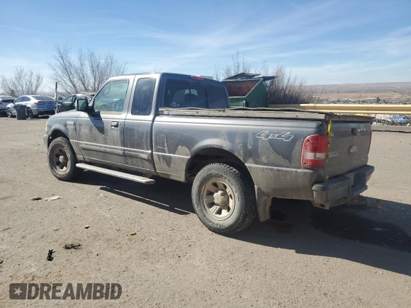 2009 Ford Ranger XLT with VIN 1FTZR45E69PA06141, listed as a Copart auction lot 43617815 with 102,986 mi miles and Salvage title. Bid and sale history available at DreamBid. Image 2.