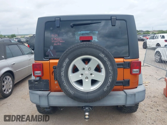2011 Jeep Wrangler Sport with VIN 1J4AA2D1XBL579882, listed as a IAAI auction lot 42122353 with 153,885 mi miles and . Bid and sale history available at carsss.com. Image 16.