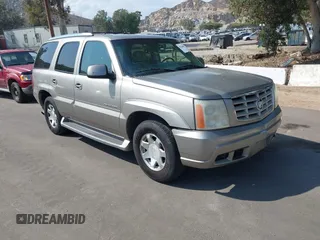 2002 Cadillac Escalade z VIN 1GYEC63T82R138951, wystawiony jako IAAI lot #42164804 z przebiegiem 265 812 mil mil oraz . Historia ofert i sprzedaży dostępna na DreamBid. Obrazek 1.