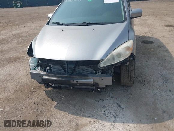 2012 Mazda 5 Touring с VIN JM1CW2CL1C0107706, выставлен на аукционе IAAI как лот 42422759 с пробегом 123 475 миль миль и . История ставок и продаж доступна на DreamBid. Изображение 6.