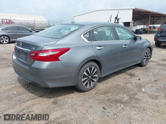 2018 Nissan Altima SR with VIN 1N4AL3AP6JC267111, listed as a IAAI auction lot 42070413 with 117,954 mi miles and . Bid and sale history available at carsss.com. Image 4.