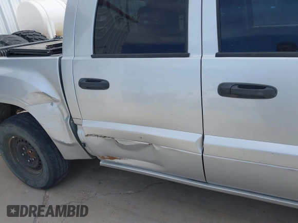 2006 Mitsubishi Raider LS z VIN 1Z7HT28KX6S576515, wystawiony jako IAAI lot #42180535 z przebiegiem 169 922 mil mil oraz . Historia ofert i sprzedaży dostępna na DreamBid. Obrazek 6.