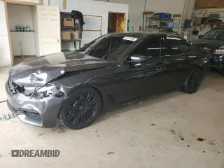 2018 BMW 5 Series 540i xDrive z VIN WBAJE7C59JWC56481, wystawiony jako Copart lot #50831085 z przebiegiem 105 558 mil mil oraz Szkoda całkowita • Salvage title. Historia ofert i sprzedaży dostępna na DreamBid. Obrazek 1.