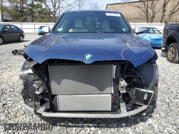 2023 BMW X1 xDrive28i with VIN WBX73EF05P5Y21721, listed as a Copart auction lot 50749295 with 10,633 mi miles and Salvage title. Bid and sale history available at DreamBid. Image 5.