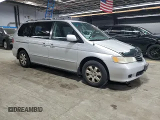 2002 Honda Odyssey EX with VIN 2HKRL18642H578718, listed as a Copart auction lot 59052525 with 170,928 mi miles and Salvage title. Bid and sale history available at DreamBid. Image 4.