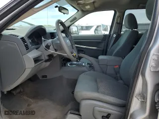 2007 Jeep Grand Cherokee Laredo with VIN 1J8GR48K27C681832, listed as a Copart auction lot 54306725 with 230,673 mi miles and Clean Title. Bid and sale history available at carsss.com. Image 7.