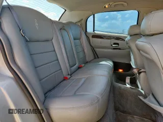 2000 Lincoln Town Car Signature with VIN 1LNHM82W9YY774120, listed as a Copart auction lot 59328725 with 137,910 mi miles and Salvage title. Bid and sale history available at DreamBid. Image 10.
