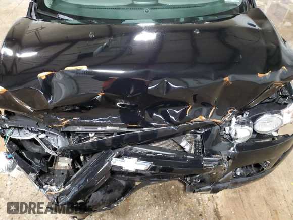 2012 Chevrolet Sonic LT z VIN 1G1JC5SHXC4142552, wystawiony jako Copart lot #44557255 z przebiegiem 135 871 mil mil oraz Szkoda całkowita • Salvage title. Historia ofert i sprzedaży dostępna na DreamBid. Obrazek 11.