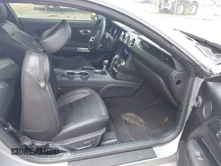 2021 Ford Mustang EcoBoost z VIN 1FA6P8TH1M5121107, wystawiony jako IAAI lot #42204097 z przebiegiem 51 542 mil mil oraz . Historia ofert i sprzedaży dostępna na DreamBid. Obrazek 5.