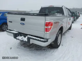 2009 Ford F-150 STX with VIN 1FTRX14829FA71591, listed as a IAAI auction lot 41322108 with 164,734 mi miles. Bid and sale history available at carsss.com. Image 4.