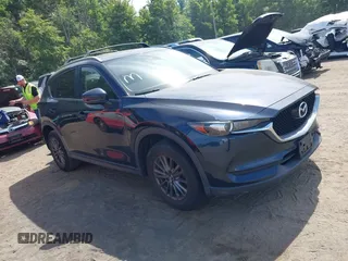 2017 Mazda CX-5 Touring z VIN JM3KFBCL5H0133493, wystawiony jako IAAI lot #39666644 z przebiegiem 125 048 mil mil oraz . Historia ofert i sprzedaży dostępna na DreamBid. Obrazek 1.