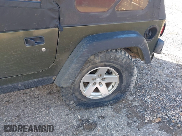 2006 Jeep Wrangler Rubicon z VIN 1J4FA69SX6P788424, wystawiony jako IAAI lot #41712349 z przebiegiem 121 684 mil mil oraz . Historia ofert i sprzedaży dostępna na DreamBid. Obrazek 6.