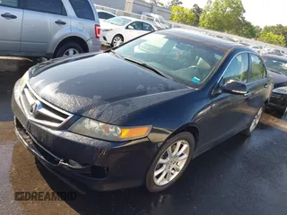 2007 Acura TSX Navi with VIN JH4CL969X7C012999, listed as a IAAI auction lot 42234186 with 205,006 mi miles and . Bid and sale history available at DreamBid. Image 2.