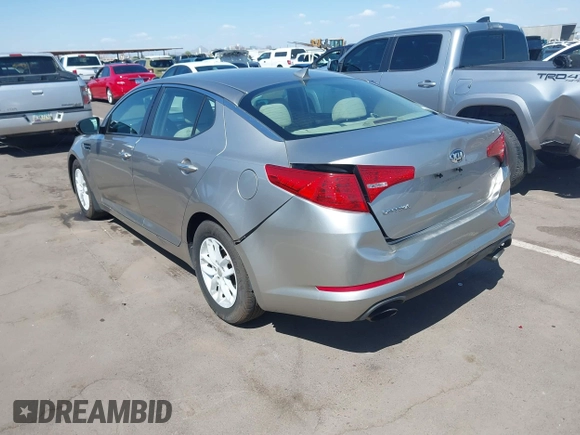 2013 Kia Optima LX with VIN KNAGM4A74D5423255, listed as a IAAI auction lot 42065230 with 116,589 mi miles. Bid and sale history available at carsss.com. Image 3.
