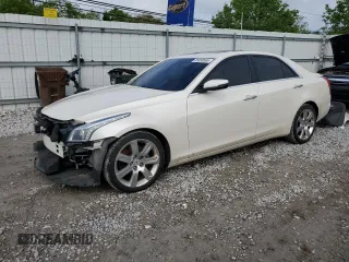 2014 Cadillac CTS Premium AWD with VIN 1G6AZ5S35E0156897, listed as a Copart auction lot 55838595 with 124,999 mi miles and Salvage title. Bid and sale history available at DreamBid. Image 1.