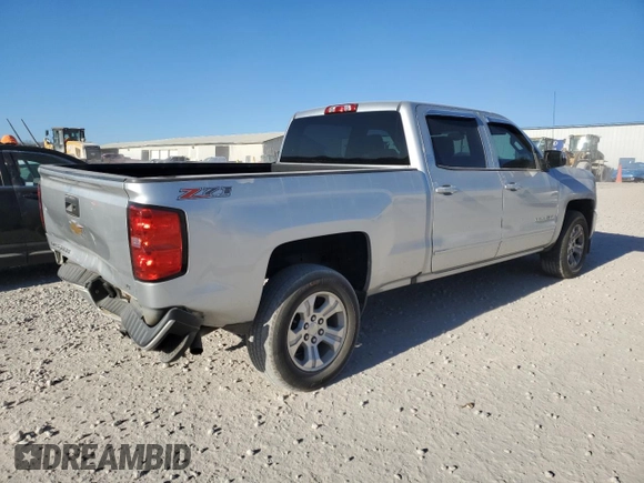 2017 Chevrolet Silverado 1500 LT with VIN 1GCUKREC0HF212120, listed as a Copart auction lot 83384734 with 119,078 mi miles and Salvage Title. Bid and sale history available at DreamBid. Image 3.