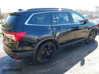 2021 Honda Pilot Special Edition with VIN 5FNYF6H21MB070818, listed as a IAAI auction lot 41632467 with 43,211 mi miles. Bid and sale history available at carsss.com. Image 4.