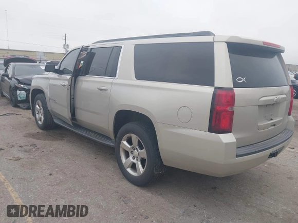 2015 Chevrolet Suburban LT with VIN 1GNSCJKC4FR744208, listed as a IAAI auction lot 41612915 with 87,445 mi miles and . Bid and sale history available at DreamBid. Image 3.