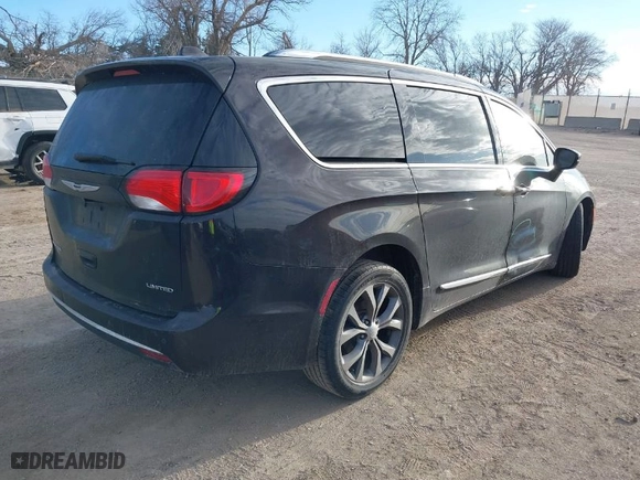 2017 Chrysler Pacifica Limited with VIN 2C4RC1GG7HR643163, listed as a IAAI auction lot 41877690 with 104,841 mi miles. Bid and sale history available at carsss.com. Image 4.