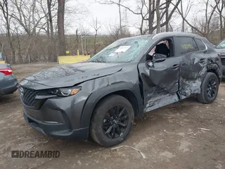 2024 Mazda CX-50 S Select z VIN 7MMVABAM9RN165867, wystawiony jako IAAI lot #41847913 z przebiegiem 17 134 mil mil oraz . Historia ofert i sprzedaży dostępna na DreamBid. Obrazek 6.