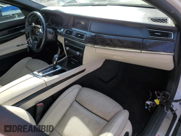 2014 BMW 7 Series 750i с VIN WBAYA8C56ED825303, выставлен на аукционе Copart как лот 46189695 с пробегом 77 573 миль миль и Списание • Salvage title. История ставок и продаж доступна на DreamBid. Изображение 8.