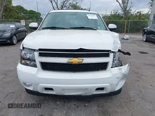 2014 Chevrolet Suburban LT with VIN 1GNSCJE06ER231476, listed as a IAAI auction lot 41768616 with 88,581 mi miles. Bid and sale history available at carsss.com. Image 6.