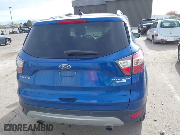 2017 Ford Escape Titanium with VIN 1FMCU0JD1HUA30076, listed as a IAAI auction lot 42024777 with 110,467 mi miles. Bid and sale history available at carsss.com. Image 16.