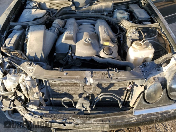 1999 Mercedes-Benz E-Class with VIN WDBJF82H9XX026911, listed as a Copart auction lot 48808835 with 205,953 mi miles and Salvage Title. Bid and sale history available at carsss.com. Image 12.