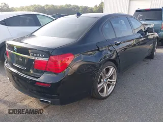 2011 BMW 7 Series 750Li xDrive with VIN WBAKC8C55BC434418, listed as a IAAI auction lot 42695385 with 93,427 mi miles and . Bid and sale history available at DreamBid. Image 4.