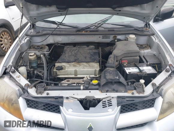 2004 Mitsubishi Outlander LS with VIN JA4LX31F04U038009, listed as a IAAI auction lot 41616254 with 219,527 mi miles. Bid and sale history available at carsss.com. Image 10.