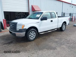2012 Ford F-150 XL with VIN 1FTFX1CF9CKD37173, listed as a IAAI auction lot 41986303 with 213,919 mi miles. Bid and sale history available at carsss.com. Image 2.
