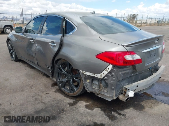 2012 Infiniti M with VIN JN1BY1AP3CM332453, listed as a IAAI auction lot 41944895 with 176,989 mi miles and . Bid and sale history available at DreamBid. Image 3.